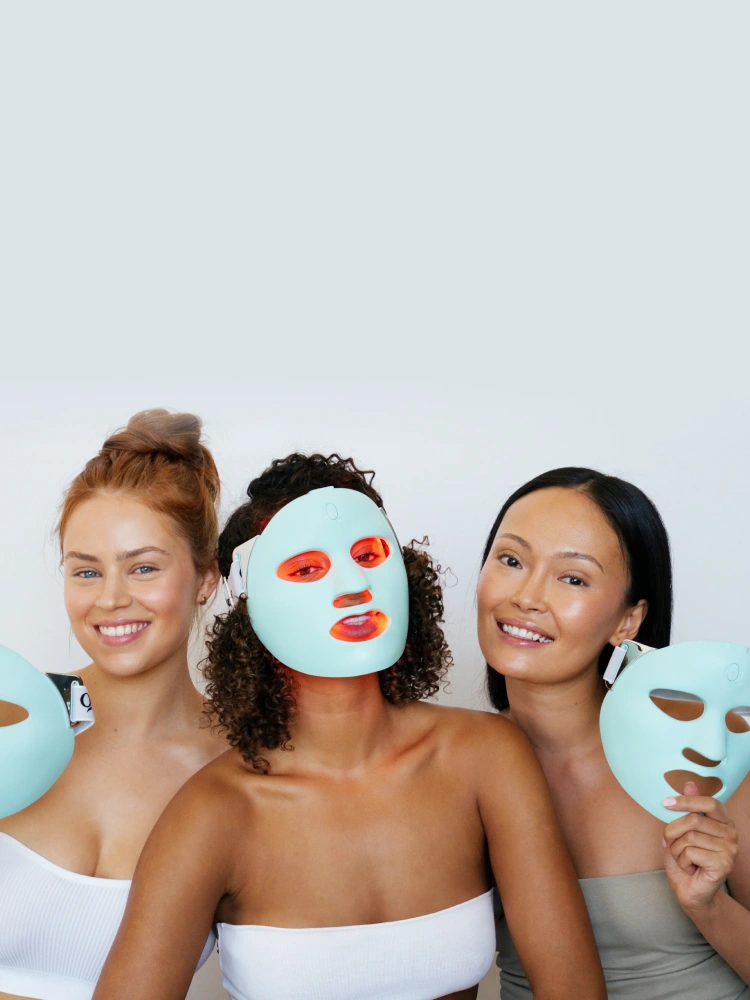 Women with LED face masks
