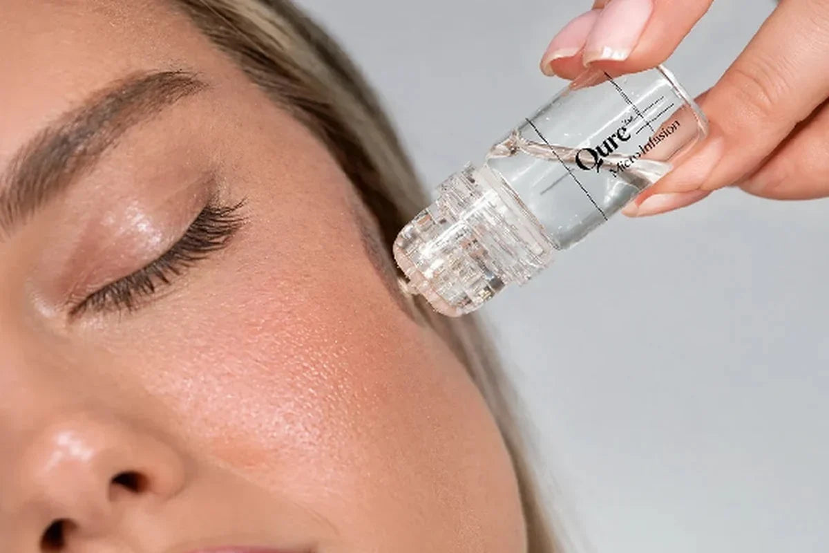 Microneedling device being applied near a woman's eye