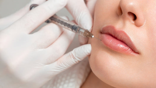 Lip filler injection procedure related to does red light therapy dissolve filler concerns.