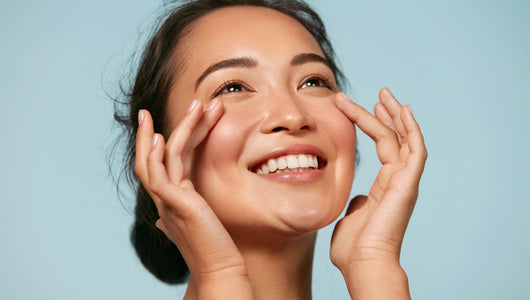 Woman with glowing, healthy-looking skin comparing qure led mask vs currentbody