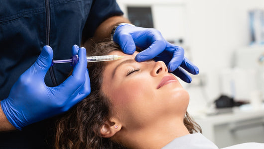 Women getting Botox injection while considering red light therapy after Botox.